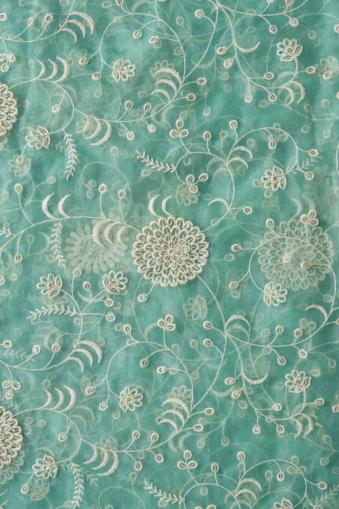 Exclusive Gold Matte Sequins With White Thread Floral Embroidery On Teal Organza Fabric