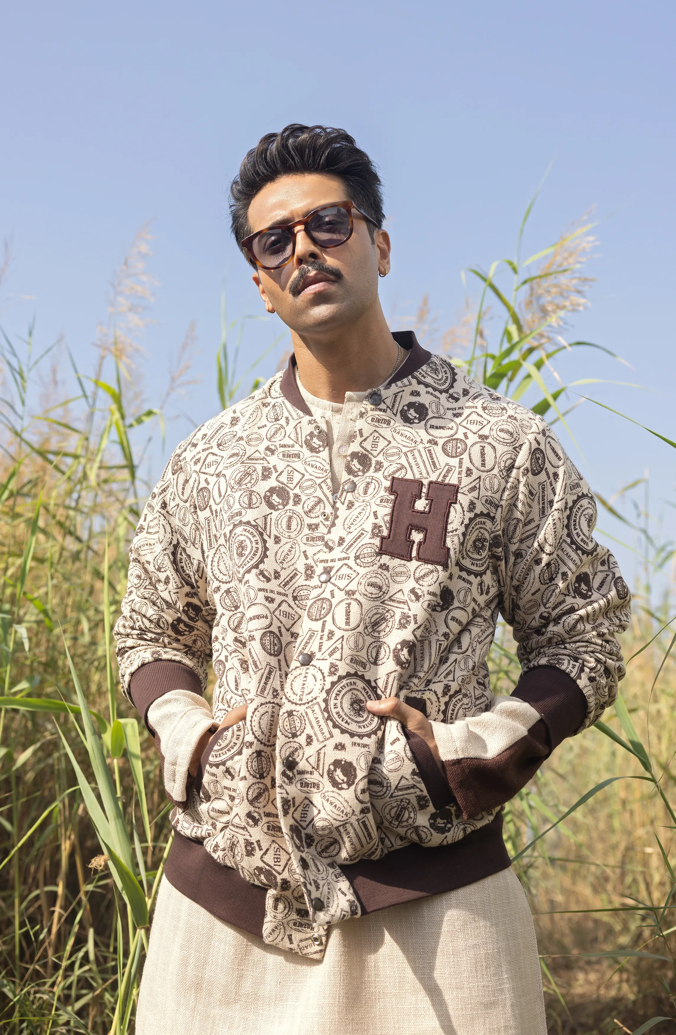 Straight Jute Kurta Paired with Pants and a Varsity Jacket